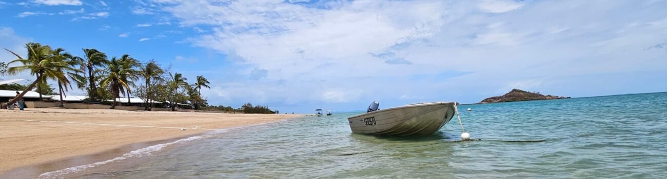 Boat moored on clear water